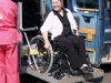 Woman with wheelchair and adapted van